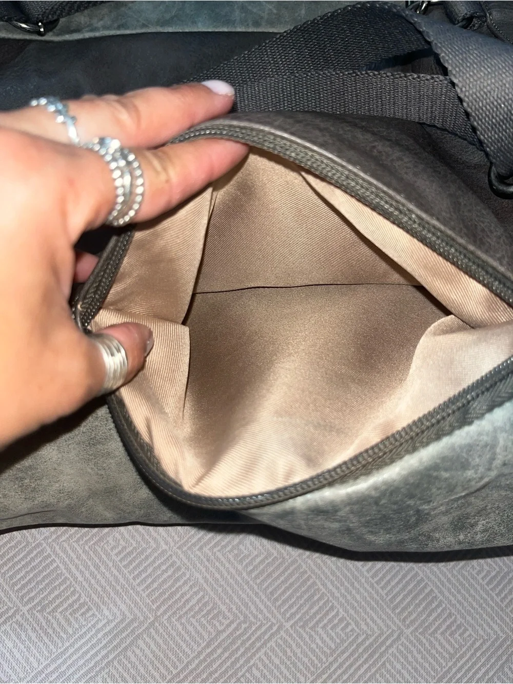 The Sak Metallic Gray Embossed Leather Backpack